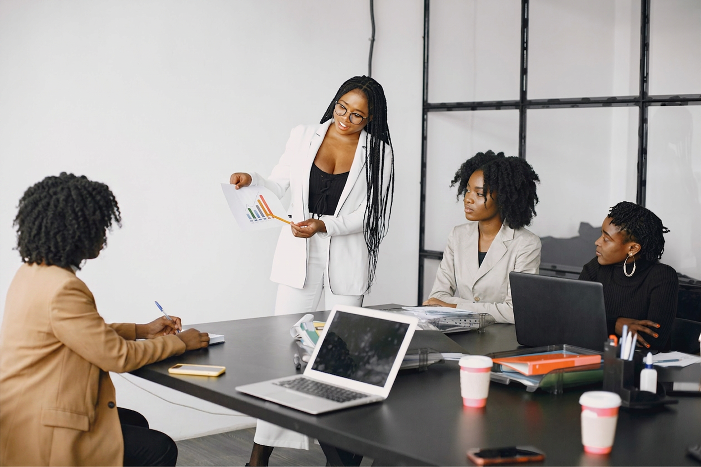 Multicultural businesswomen group meeting